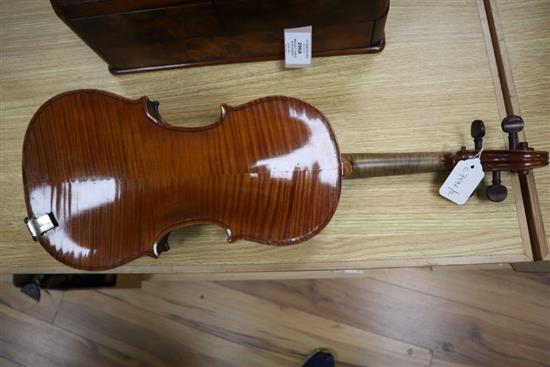 A ate 19th century German violin labelled Heinrich Schwartz Leipzig 1894 cased with a bow